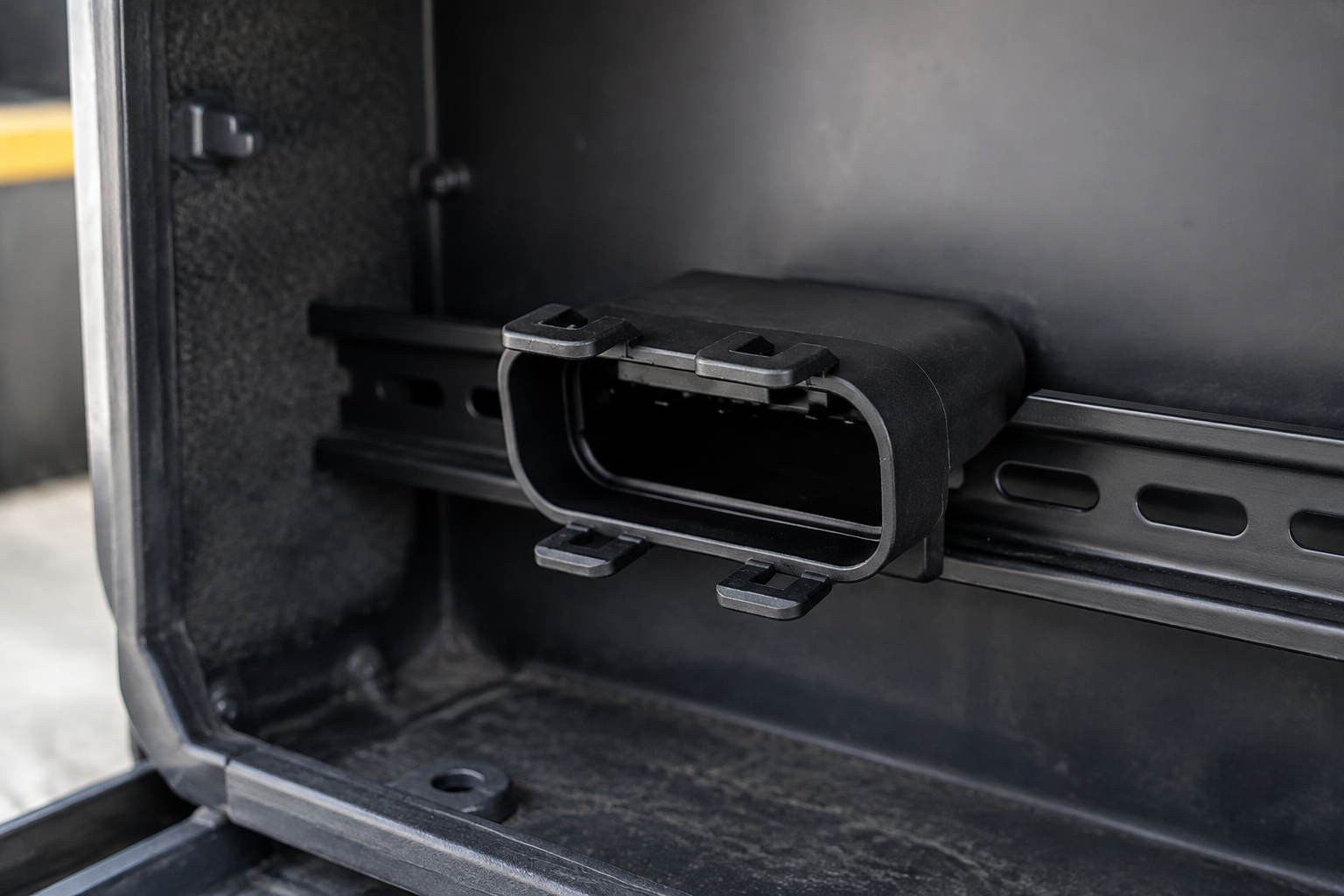 CNSJ connector housing mounted in a commercial vehicle electrical distribution compartment